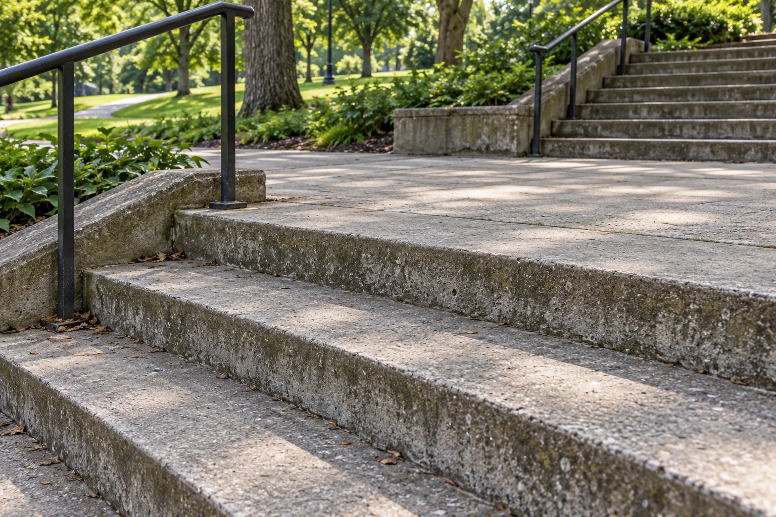 Concrete stair treads, riser faces and an intermediate landing